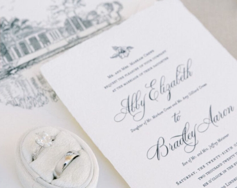 Griffeth and Sarah Whitehurst embrace on the mezzanine of Whitehurst Gallery.