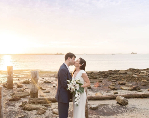 Griffeth and Sarah Whitehurst embrace on the mezzanine of Whitehurst Gallery.